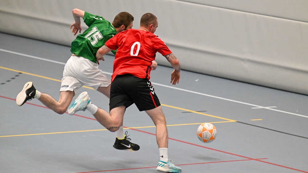 Korfballers van Nexus strijdend ten onder tegen Rapid