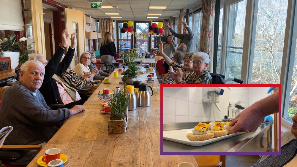 Schiedammers in de feeststemming en vieren feestjaar met gebak