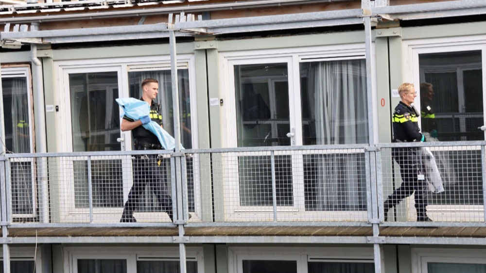 Vuurwapens gevonden in containerwoning District U na brand